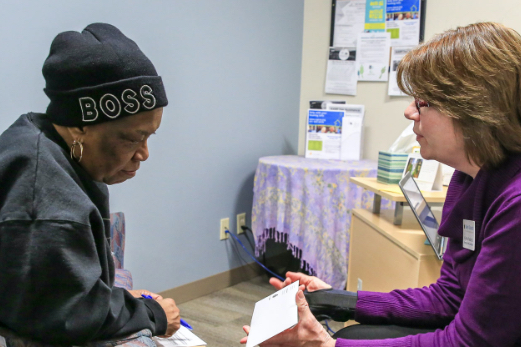 Support staff working with woman