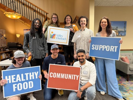 group of people holding signs