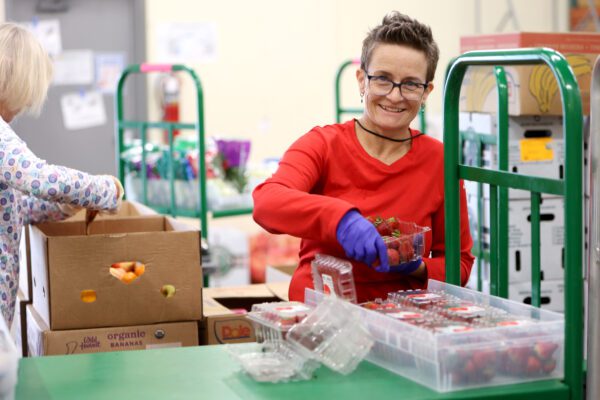 Volunteer in food shelf