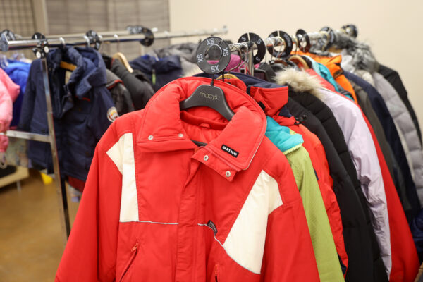 Winter coats on clothing rack
